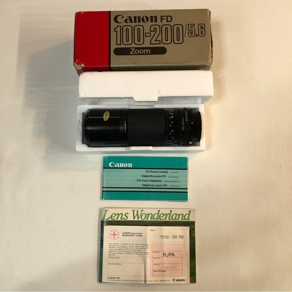 Vintage Canon AE-1 w/ 50mm Lens, ZYKKOR Flash, Canon FD 100-200/5.6 Zoom etc. - Picture 4 of 13